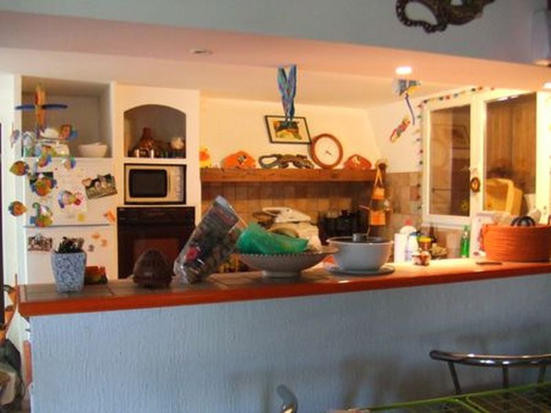 Vente Villa T4 Marignane 13700  Grand séjour avec cuisine ouverte. 250m² de terrain env.